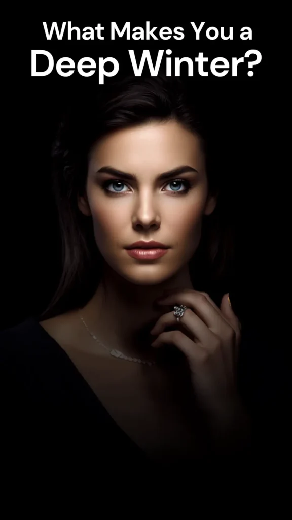 A dramatic Pinterest pin titled "What Makes You a Deep Winter?" providing seasonal color analysis for a women's fashion Capsule Wardrobe. Set against a moody dark background, it features a striking close-up portrait of a woman with rich dark hair, vivid blue eyes, and elegant makeup, wearing fine jewelry. An ideal guide for determining color contrast and undertones to curate a cohesive, flattering minimalist wardrobe tailored to deep winter palette types.