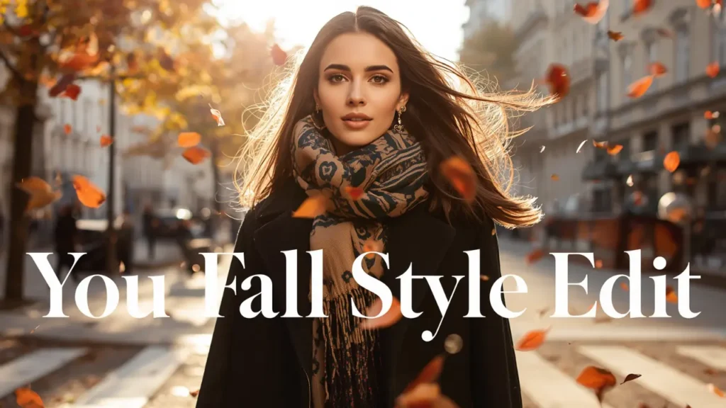 A Pinterest pin graphic with white text overlay reading "You Fall Style Edit" showcasing chic autumn outfit inspiration for a women's fashion Capsule Wardrobe. Set on a sunlit city street with swirling orange autumn leaves, a brunette model walks forward wearing a black coat and a cozy patterned scarf around her neck. An ideal visual guide for fall street style, seasonal layering ideas, and building a sophisticated, minimalist autumn closet collection.